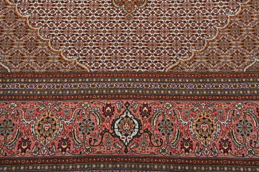 Backside of handmade New Tabriz rug showing knot structure and weave density