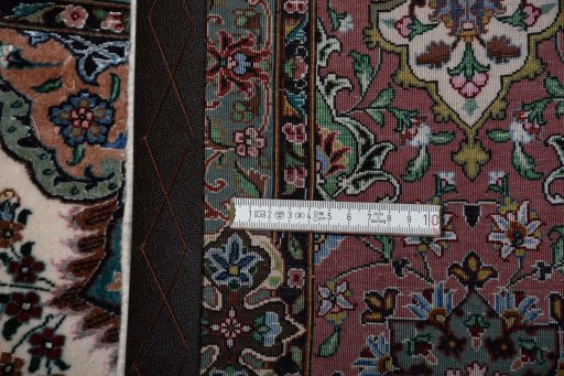 Corner detail of New Tabriz rug showing border pattern and Cork pile