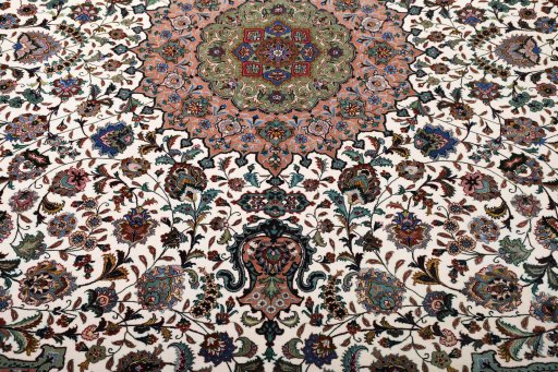 Central medallion detail of New Tabriz rug from Iran / Persia