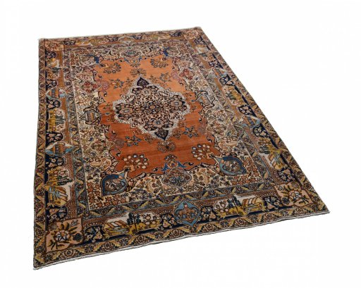 Corner detail of 1930s Tabriz rug showing border pattern and Wool pile