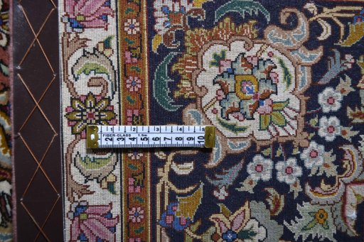 Central medallion detail of New Tabriz rug from Iran / Persia