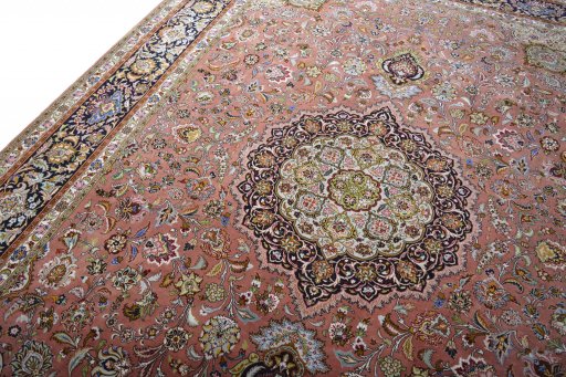 Backside of handmade New Tabriz rug showing knot structure and weave density