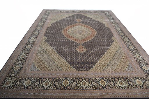 Surface texture of 2000s Tabriz rug with natural Cork and intricate pattern