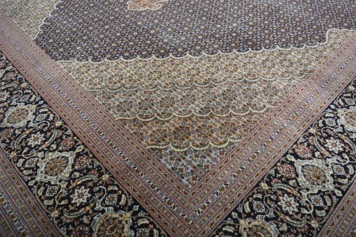 Close-up detail of 2000s Tabriz rug from Iran / Persia showing Cork weave