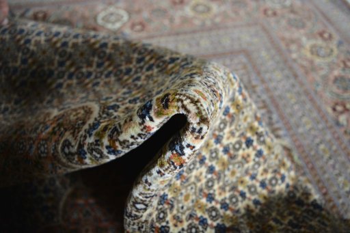 Surface texture of New Tabriz rug with natural Cork and intricate pattern