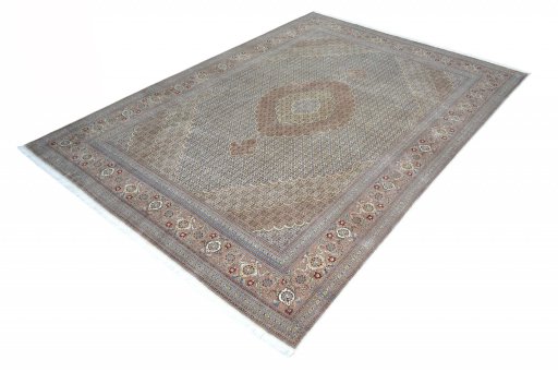 Corner detail of New Tabriz rug showing border pattern and Cork pile