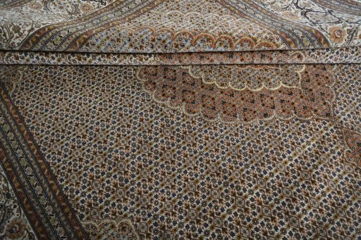 Close-up detail of 2000s Tabriz rug from Iran / Persia showing Cork weave
