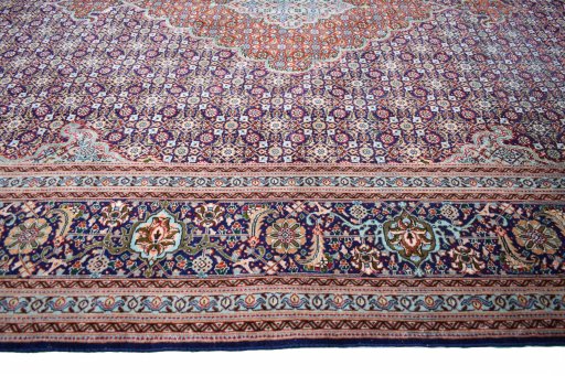 Corner detail of New Tabriz rug showing border pattern and Cork pile