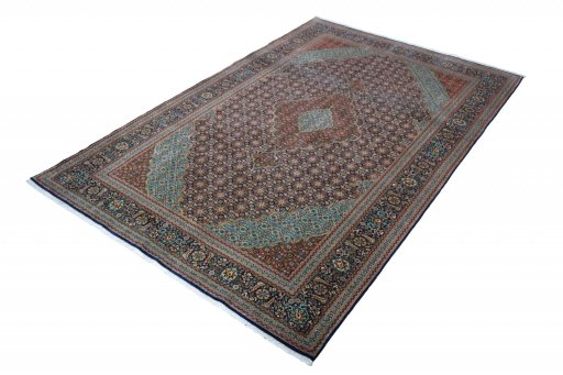 Corner detail of New Tabriz rug showing border pattern and Cork pile