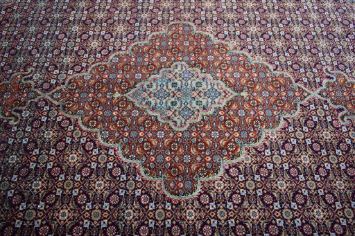 Central medallion detail of New Tabriz rug from Iran / Persia
