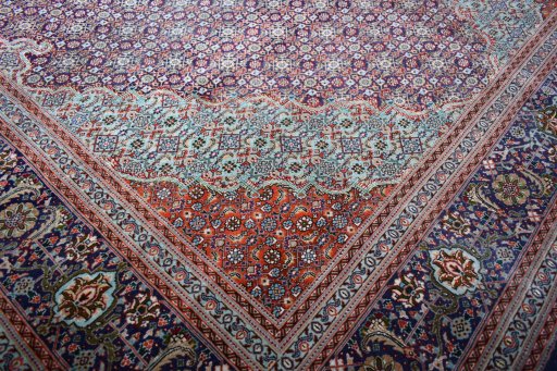 Close-up detail of New Tabriz rug from Iran / Persia showing Cork weave
