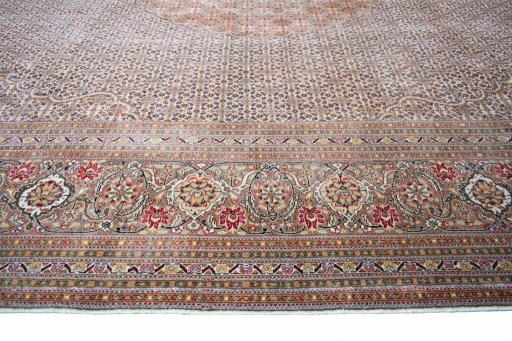 Corner detail of New Tabriz rug showing border pattern and Cork pile
