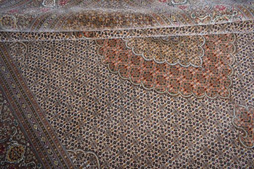 Close-up detail of New Tabriz rug from Iran / Persia showing Cork weave