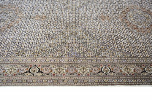 Corner detail of Unknown Tabriz rug showing border pattern and Wool pile
