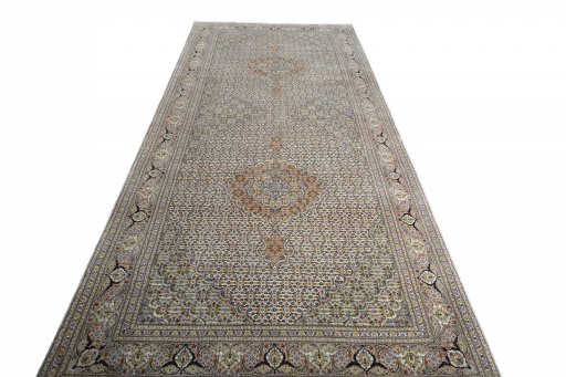 Surface texture of Unknown Tabriz rug with natural Wool and intricate pattern