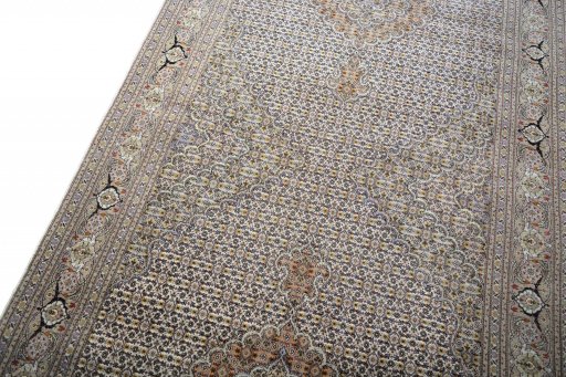 Backside of handmade Unknown Tabriz rug showing knot structure and weave density