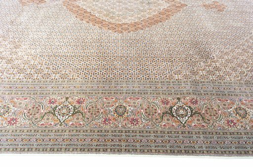 Close-up detail of 2000s Tabriz rug from Iran / Persia showing Cork weave
