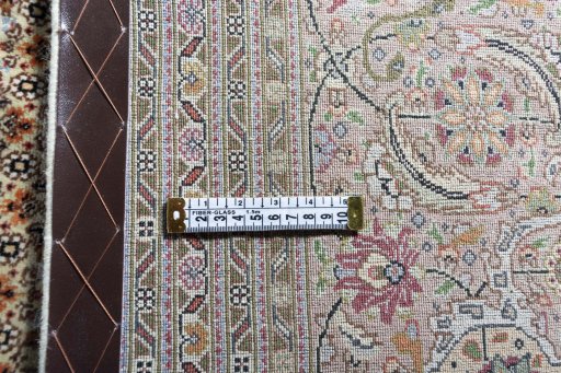 Central medallion detail of 2000s Tabriz rug from Iran / Persia