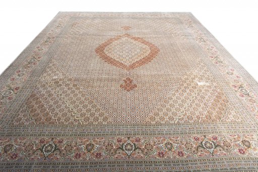 Surface texture of 2000s Tabriz rug with natural Cork and intricate pattern