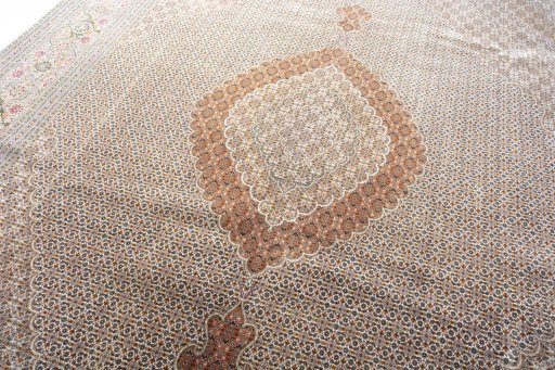 Backside of handmade 2000s Tabriz rug showing knot structure and weave density