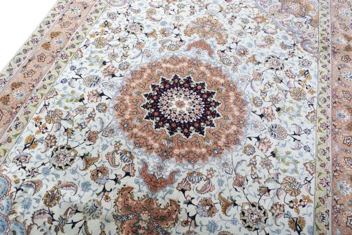 Backside of handmade New Tabriz rug showing knot structure and weave density