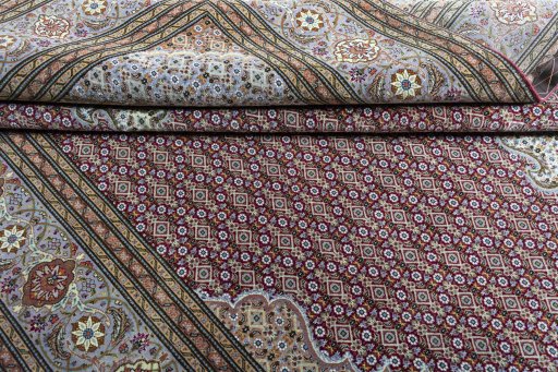 Close-up detail of New Tabriz rug from Iran / Persia showing Cork weave