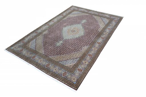 Corner detail of New Tabriz rug showing border pattern and Cork pile