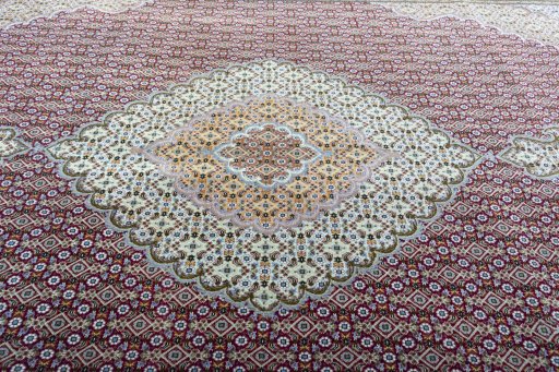 Central medallion detail of New Tabriz rug from Iran / Persia