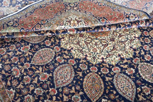 Surface texture of 1970s Tabriz rug with natural Wool and intricate pattern