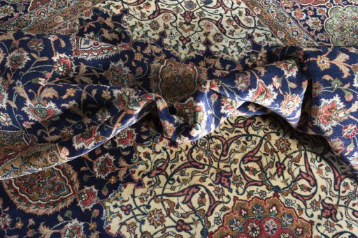 Backside of handmade 1970s Tabriz rug showing knot structure and weave density