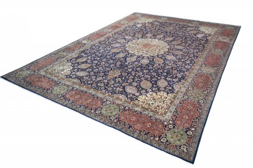 Corner detail of 1970s Tabriz rug showing border pattern and Wool pile
