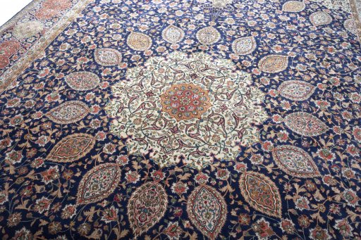 Backside of handmade 1970s Tabriz rug showing knot structure and weave density