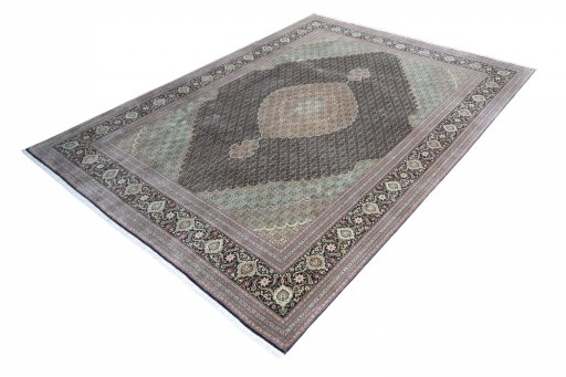 Corner detail of New Tabriz rug showing border pattern and Cork pile