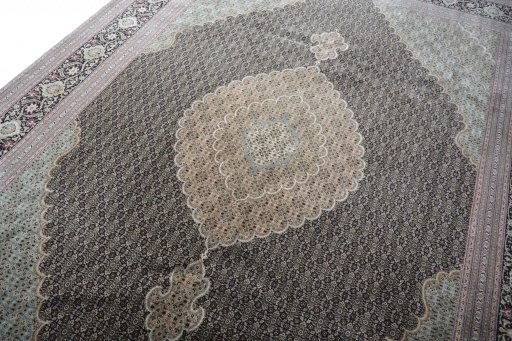 Backside of handmade New Tabriz rug showing knot structure and weave density