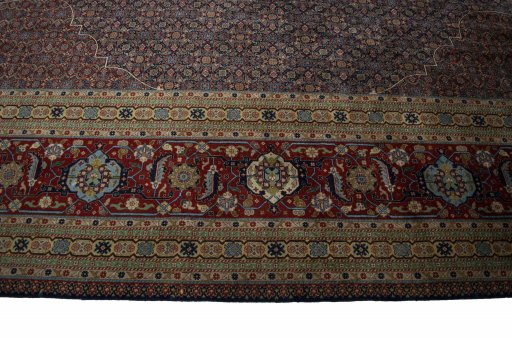 Close-up detail of 1930s Tabriz rug from Iran / Persia showing Wool weave