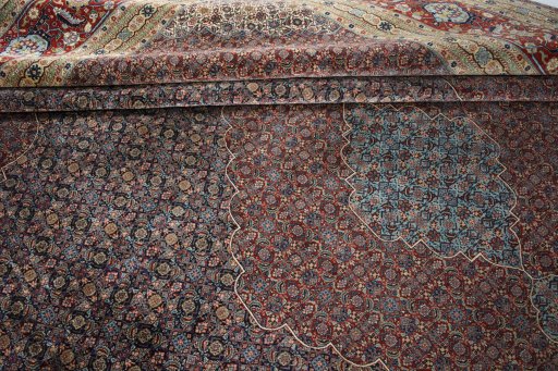 Surface texture of 1930s Tabriz rug with natural Wool and intricate pattern