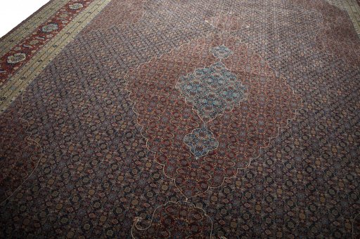 Backside of handmade 1930s Tabriz rug showing knot structure and weave density