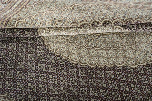 Close-up detail of New Tabriz rug from Iran / Persia showing Cork weave