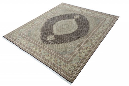 Corner detail of New Tabriz rug showing border pattern and Cork pile