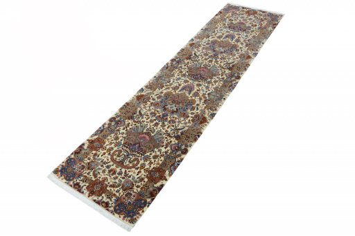 Corner detail of New Tabriz rug showing border pattern and Wool pile