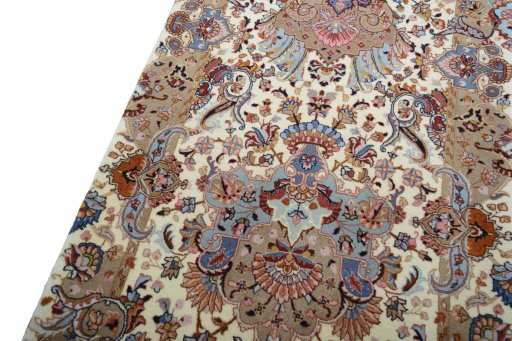 Backside of handmade New Tabriz rug showing knot structure and weave density
