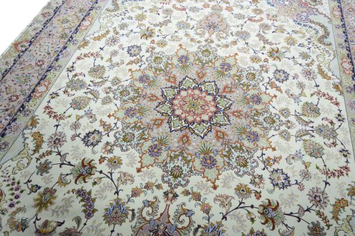 Backside of handmade New Tabriz rug showing knot structure and weave density