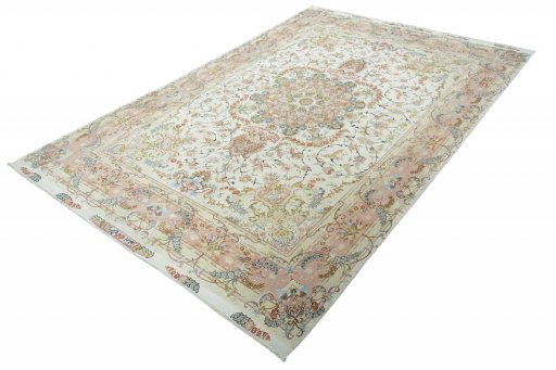 Corner detail of New Tabriz rug showing border pattern and Cork pile
