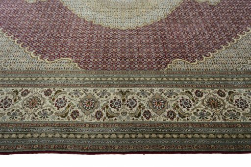 Corner detail of New Tabriz rug showing border pattern and Cork pile