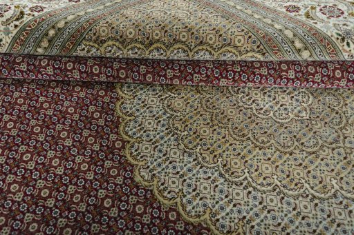 Close-up detail of New Tabriz rug from Iran / Persia showing Cork weave