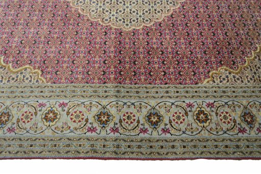 Corner detail of New Tabriz rug showing border pattern and Cork pile