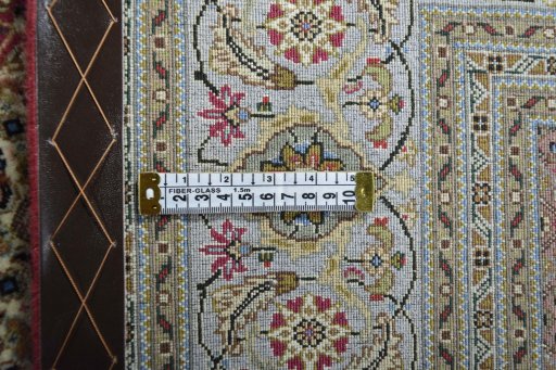 Backside of handmade New Tabriz rug showing knot structure and weave density