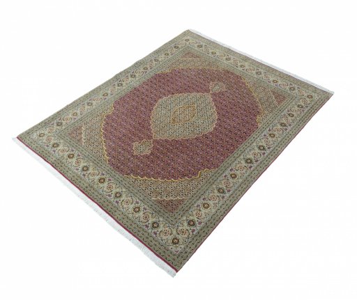 Corner detail of New Tabriz rug showing border pattern and Cork pile
