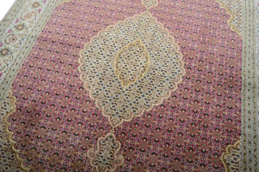 Backside of handmade New Tabriz rug showing knot structure and weave density