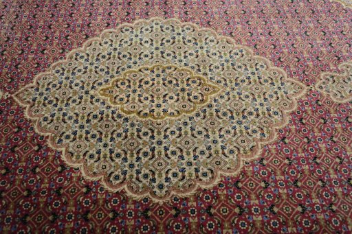 Central medallion detail of New Tabriz rug from Iran / Persia